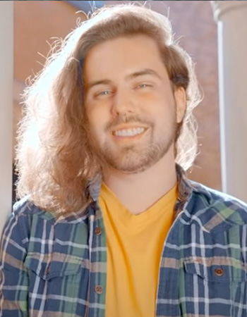 Meet Jared smiling at the Jordan Schnitzer Museum of Art on UO campus